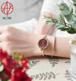 ساعت مچی زنانه جولیوس (Julius) مدل JA-1293C رزگلد (بند النگویی ظریف، صفحه زرشکی) 4